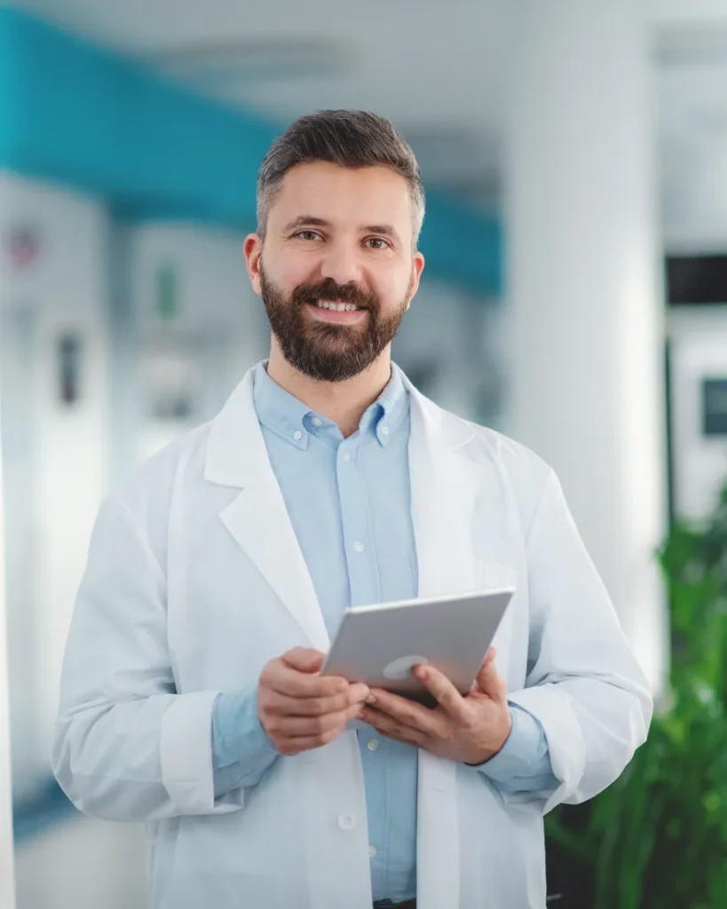 Physician using a tablet in a modern medical practice with DocVilla cloud EHR